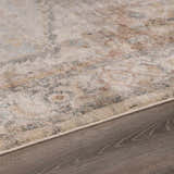 Close-up of the Vaeda Blue & Beige Thick Luxe Rug showing its beige, tan, and gray traditional pattern and soft texture. Pile