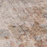 Close-up of the Vaeda Blue & Beige Thick Luxe Rug showing its beige, pink, tan, and blue traditional pattern. Texture