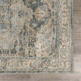 Close-up of the Vaeda Blue Thick Luxe Rug, showcasing its beige, gray, and pale blue traditional pattern. Corner
