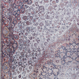 Close-up of the Red Cael Tumble Dry Washable Rug, featuring a vintage Persian floral design in red, navy, and off-white hues. Swatch