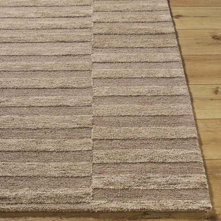 Close-up of the hand-tufted Idaho Broken-Striped Brown Area Rug. Beige and taupe wool rug with a contemporary broken stripe pattern. Front
