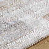 Close-up of the Anaisa Beige Luxe Thick Area Rug showing geometric patterns and plush texture. Texture