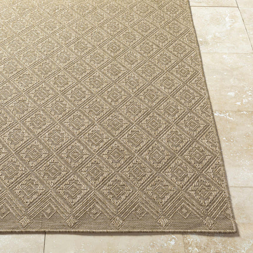 Close-up of the Bandit Brown Area Rug showing its woven diamond pattern and camel, tan, and prairie dust colors. Front