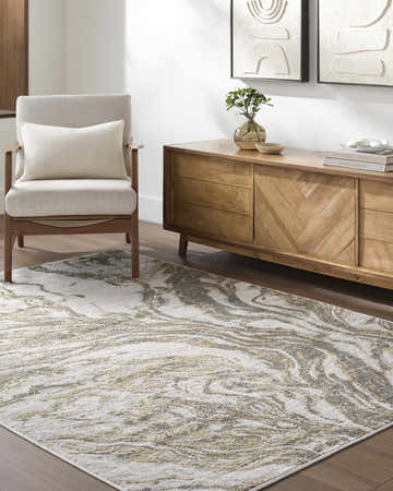 Living room scene with a Brandi Beige Marble Area Rug, gray chair, and wooden cabinet. Roomscene-Rectangle