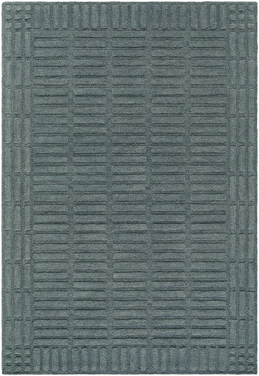 Close-up of the hand-tufted Birger Slate Blue Area Rug. Features a contemporary geometric pattern in slate blue and steel gray wool. Design-Rectangle-576