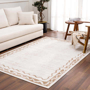 Living room scene with beige sofa and Beatus Washable Area Rug in beige and light brown with geometric pattern. Roomscene-Rectangle