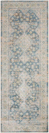 Close-up of the Bhavya Navy Washable Area Rug featuring a traditional, distressed diamond pattern in navy, brown, and beige. Design-Runner-2773