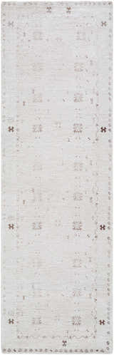 Close-up of the hand-tufted Bhavna Area Rug. Ivory rug with a subtle sandstone and taupe traditional pattern. Design-Runner-268