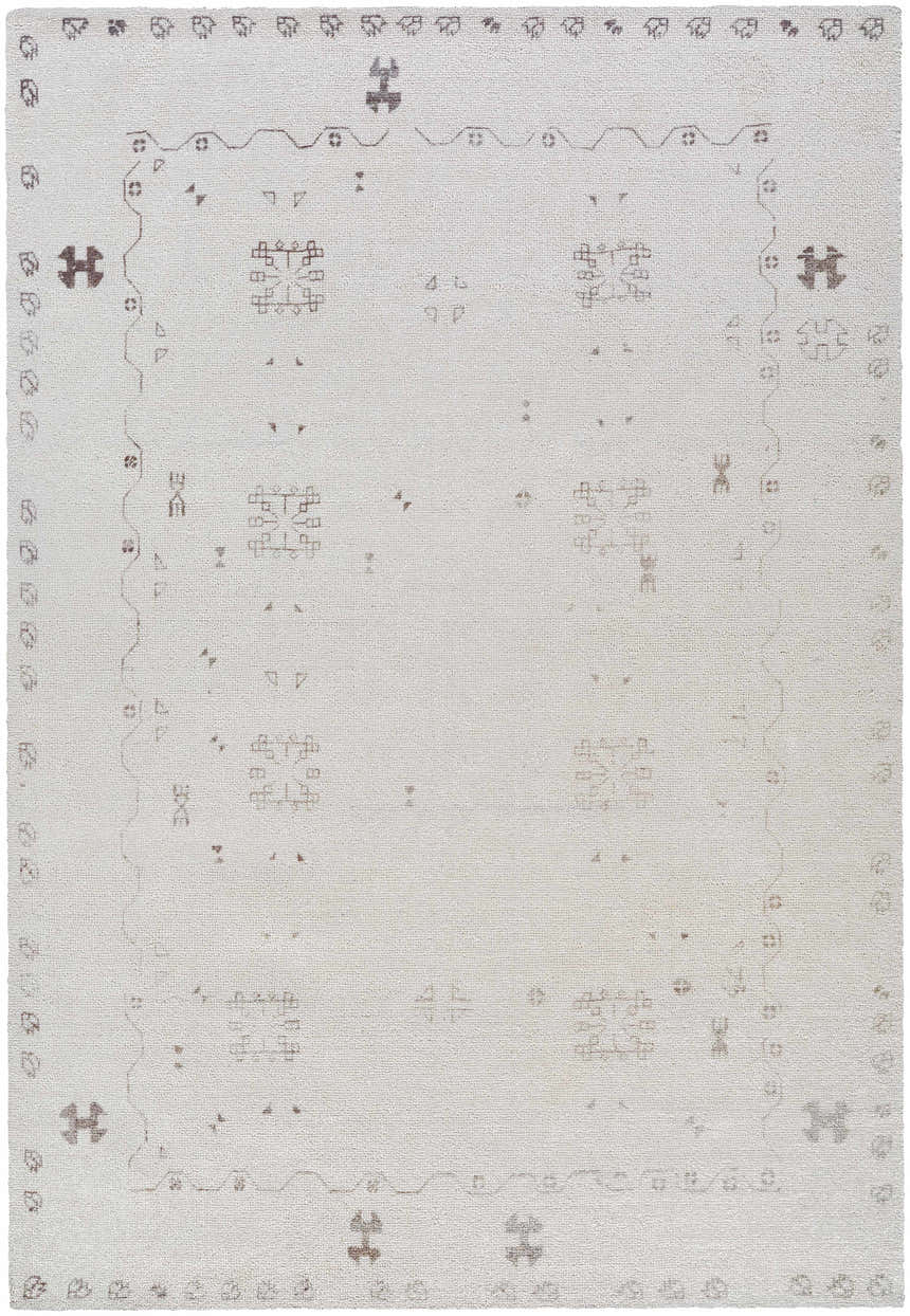Close-up of the hand-tufted Bhavna Area Rug. Ivory rug with sandstone and taupe traditional pattern. 100% polyester. Design-Rectangle-576