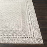 Close up of the Livabliss Bahar BHR-2321 area rug in charcoal and off white with a farmhouse-inspired geometric pattern. Front