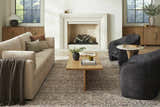 Living room scene with beige sofa, fireplace, and Collins Avenue III Vintage Damask Area Rug in beige, red, and green. Roomscene-Rectangle