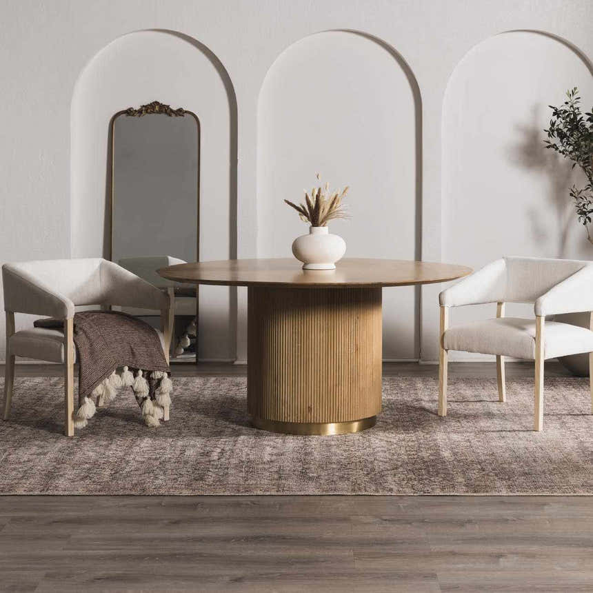 Dining room with round table and beige chairs on Collins Avenue III Vintage Damask Area Rug. Roomscene-Rectangle