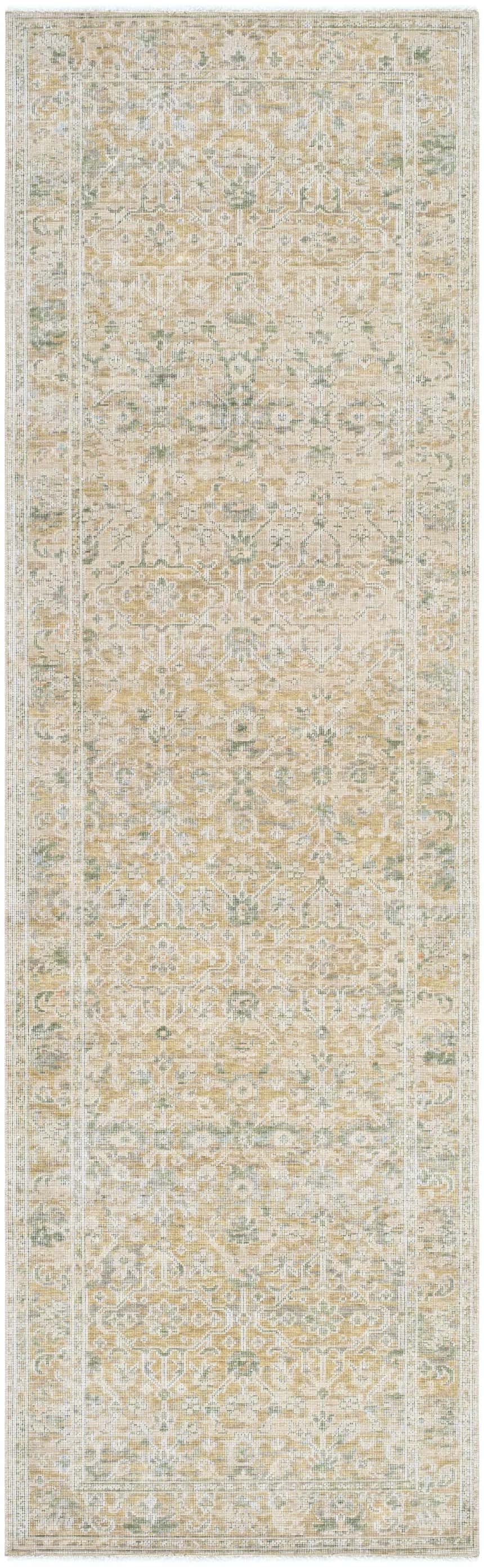 Close-up of Becki Olive Owens x Livabliss Renaissance Area Rug. Beige, olive, and tan floral pattern. Hand-crafted wool rug. Design-Runner