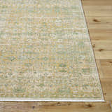 Close up of the Becki Olive Owens x Livabliss Renaissance Area Rug, a beige, olive, and tan traditional wool rug. Front