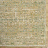 Close-up of Becki Olive Owens x Livabliss Renaissance Area Rug. Beige, olive, tan, and taupe traditional floral pattern. Corner