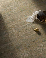 Close-up of the Becki Olive Owens x Livabliss Renaissance Area Rug; beige, olive, and tan traditional pattern. Styleshot