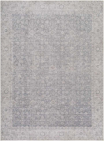 Close-up of the Spokane Gray Area Rug. Farmhouse style rug with charcoal, dark brown, and off-white traditional pattern. Design-Rectangle-527