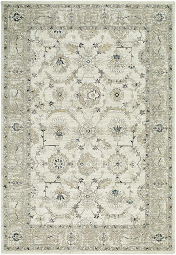Close-up of the Yume Ivory Persian rug, showcasing its charcoal, olive, and slate blue floral pattern and traditional design. Design-Rectangle-6796