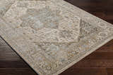 Close-up of the Ballisodare Thick Luxe Boutique Rug, showcasing its traditional oriental pattern in beige, gray, and olive tones. Corner