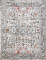 Detailed view of the Bolinas Area Rug, a traditional design in brick red, camel, and gray polypropylene. Design-Rectangle