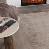 Close-up of the beige Galey Alix Collins Avenue Vintage Medallion Rug with a subtle traditional pattern and soft texture. Styleshot