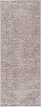 Close-up of the Galey Alix Collins Avenue VI Vintage Medallion Rug. Features a traditional, distressed dark brown and ivory pattern. Design-Runner-2773