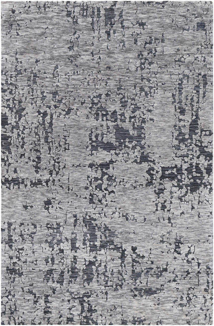 Close-up of Bomaderry Area Carpet. Contemporary design in charcoal, light gray, and medium gray. Hand woven polyester rug. Design-Rectangle-576