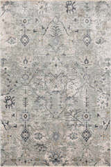 Close-up of the Barkisland Thick Luxe Oushak Rug. Features a traditional floral pattern in teal, sage, beige, and gray tones. Design-Rectangle