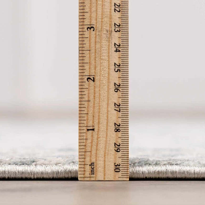 Close-up of the thick pile height of the Barkisland Luxe Oushak Rug, showing its construction. Pile