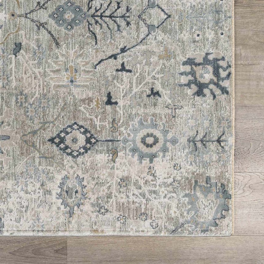 Close-up of the Barkisland Thick Luxe Oushak Rug. Features deep teal, sage, and beige floral and geometric patterns. Swatch