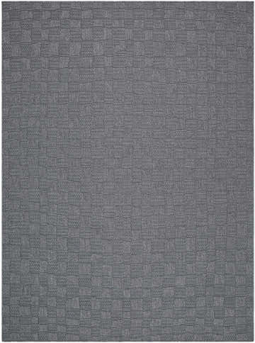 Close-up of the Arifah Gray Area Rug. The rug has a subtle geometric pattern of squares in varying shades of gray. Design-Rectangle-537