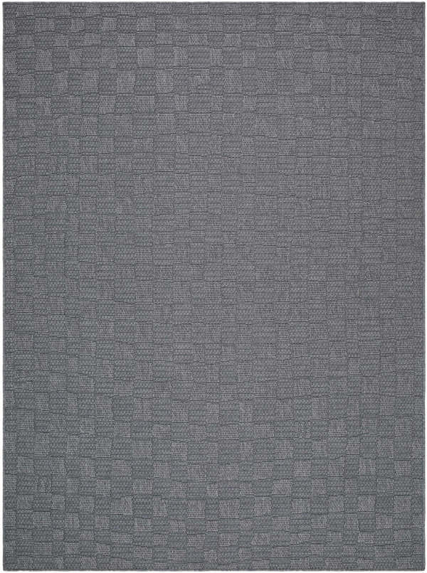 Close-up of the Arifah Gray Area Rug. The rug has a subtle geometric pattern of squares in varying shades of gray. Design-Rectangle-537