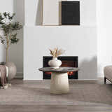 Living room scene with a beige Brushton Area Rug, fireplace, round table, and neutral decor. Roomscene-Rectangle