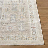 Close-up of Fugia Beige Persian rug showing traditional pattern and texture on hardwood floor. Front