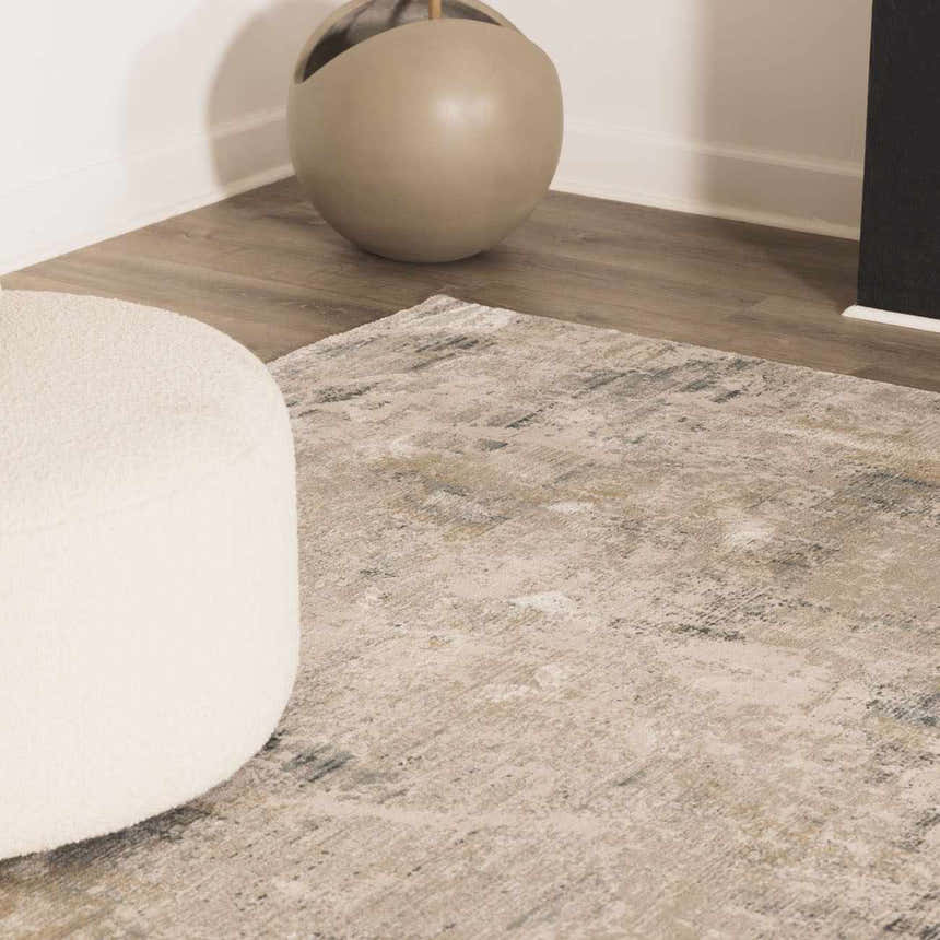 Close-up of the Burstwick Thick Luxe Boutique Rug, a contemporary rug in dusty sage, navy, olive, and taupe. Styleshot