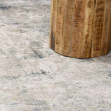 Close-up of Burstwick Thick Luxe Boutique Rug showing its dusty sage, navy, and taupe abstract pattern and soft texture. Styleshot