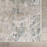 Close-up of the Burstwick Thick Luxe Boutique Rug. Abstract pattern in dusty sage, navy, olive, pale blue, and taupe. Swatch