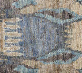 Close-up of the Bushong Jute Carpet. Hand-knotted Southwestern design in blue, brown, gray, and white jute fibers. Swatch