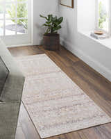 Entryway with Bienna Vintage Flat Pile Washable Rug in camel, cream, and brown. Farmhouse style runner rug on wood floor. Roomscene-Runner