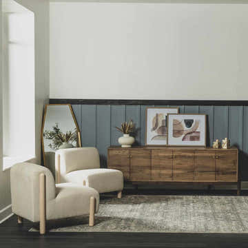Living room scene with beige chairs and a Collins Avenue Vintage Oushak Area Rug in beige, gray, and brown tones. Roomscene-Rectangle