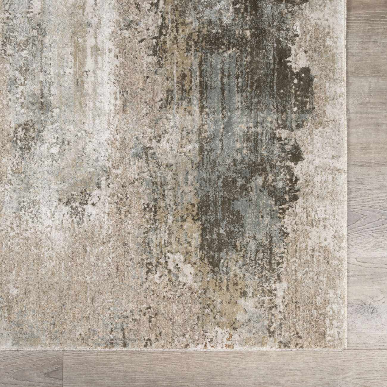 Close-up of the Bowdoinham Thick Luxe Boutique Rug. Abstract design in charcoal, sage, gray, taupe, and white. Swatch
