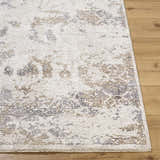 Close-up of the Breeda Charcoal Area Rug showing its Southwestern pattern, charcoal, cream, ivory, and tan colors. Front