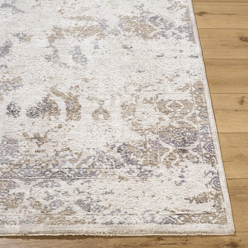 Close-up of the Breeda Charcoal Area Rug showing its Southwestern pattern, charcoal, cream, ivory, and tan colors. Front