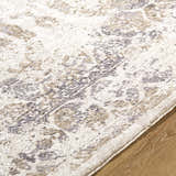 Close-up of the Breeda Charcoal Area Rug showing its Southwestern-style pattern in charcoal, cream, ivory, olive, and tan. Texture