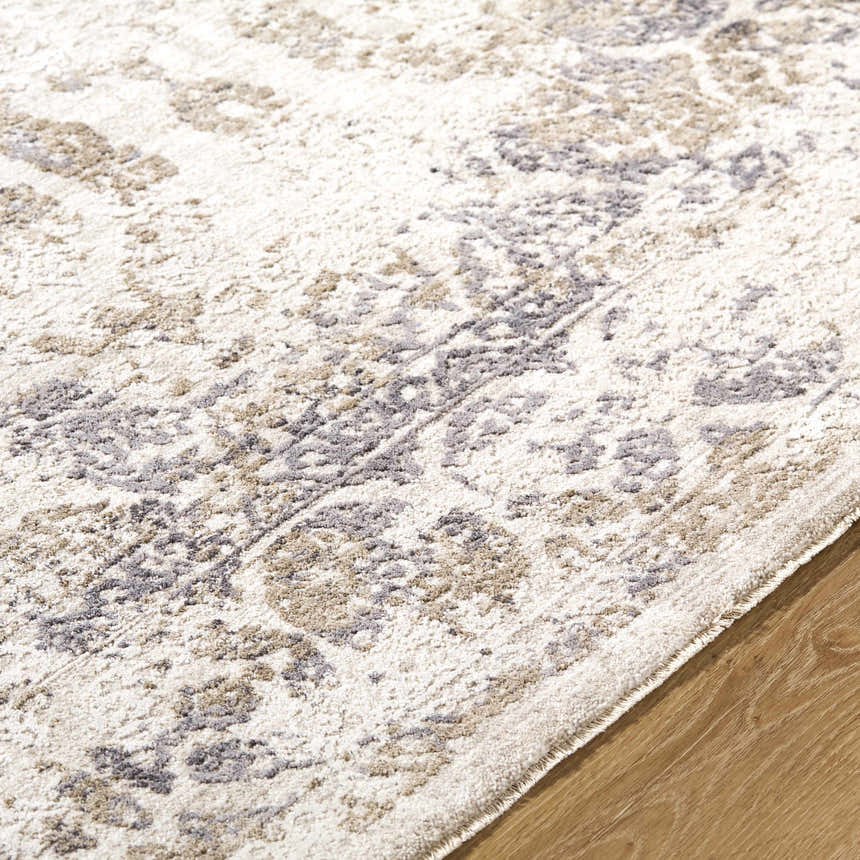 Close-up of the Breeda Charcoal Area Rug showing its Southwestern-style pattern in charcoal, cream, ivory, olive, and tan. Texture