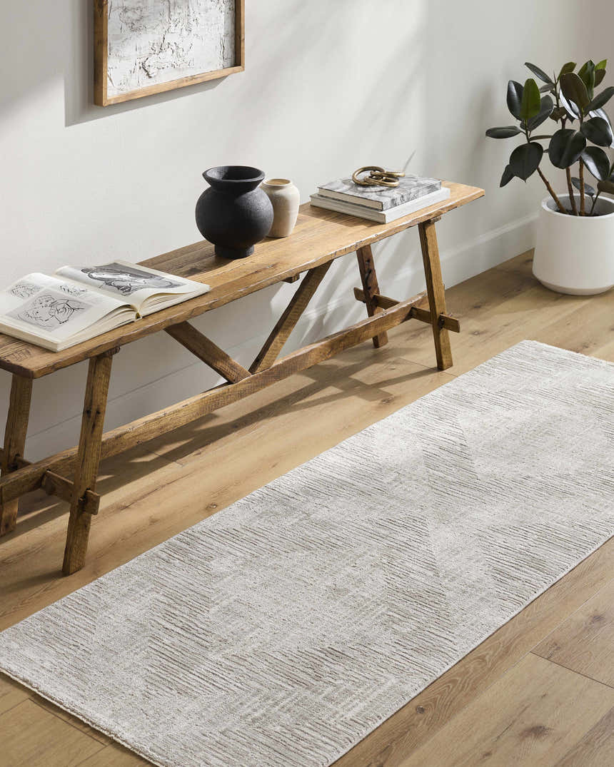 Hallway scene with light wood floors, bench, and Barend runner rug in ash and silver. Southwestern style. Roomscene-Runner