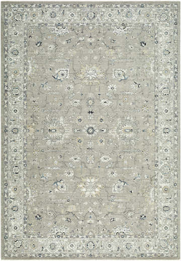 Close-up of the Briony Area Rug. Farmhouse style with a traditional floral pattern in neutral gray, cream, and blue tones. Design-Rectangle-6796