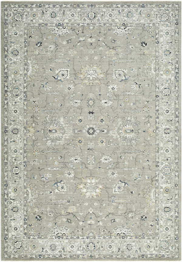 Close-up of the Briony Area Rug. Farmhouse style with a traditional floral pattern in neutral gray, cream, and blue tones. Design-Rectangle-6796