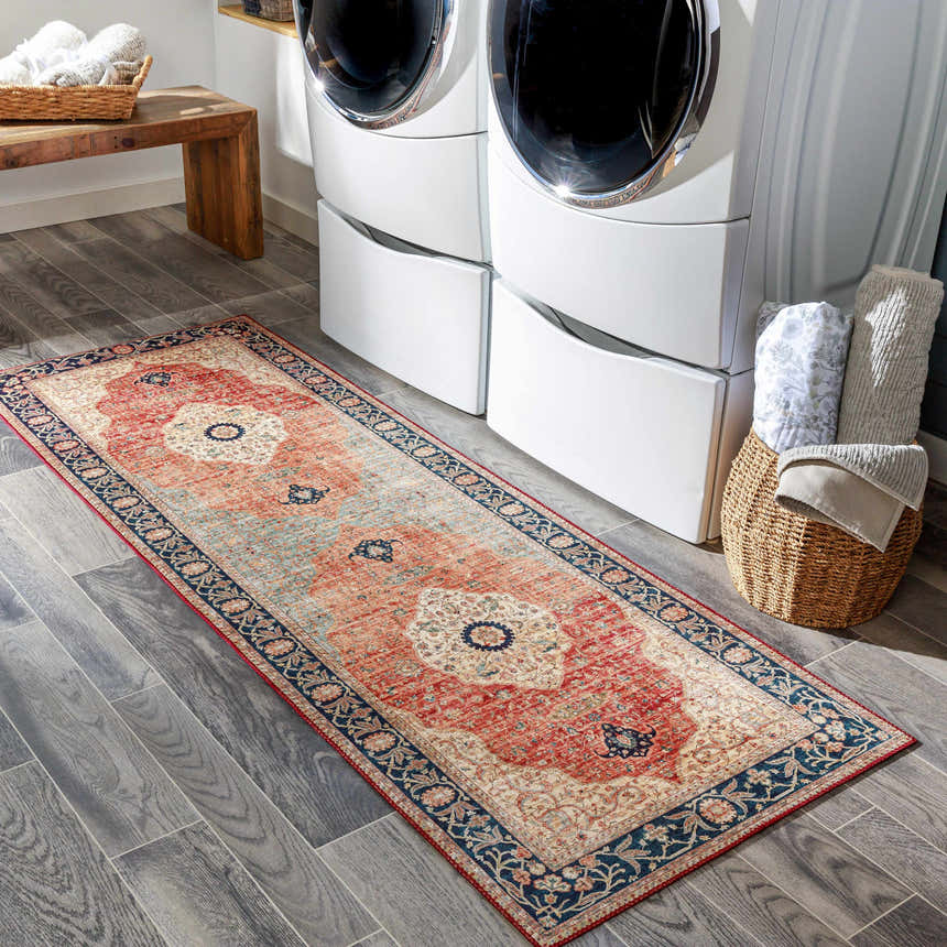 Laundry room scene with Camperdown Area Rug runner in burnt orange, cream, and blue. Farmhouse style with washing machines and wood floors. Roomscene-Runner