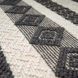 Close-up of the Whittington Black&White Wool Rug showing the diamond pattern, wool texture, and hand-woven construction. Texture